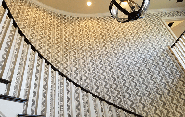 <img src="Chapala.gif" alt="Curved staircase with squiggly line wallpaper">