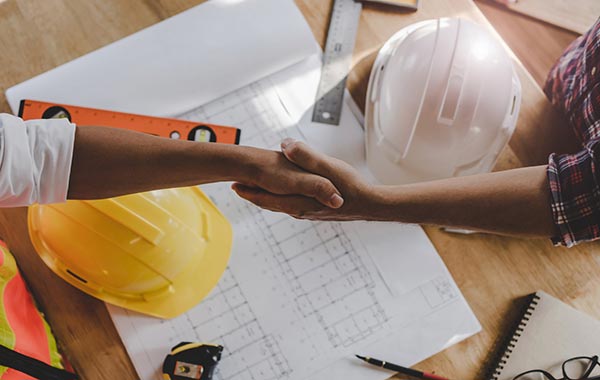 Contractors shaking hands