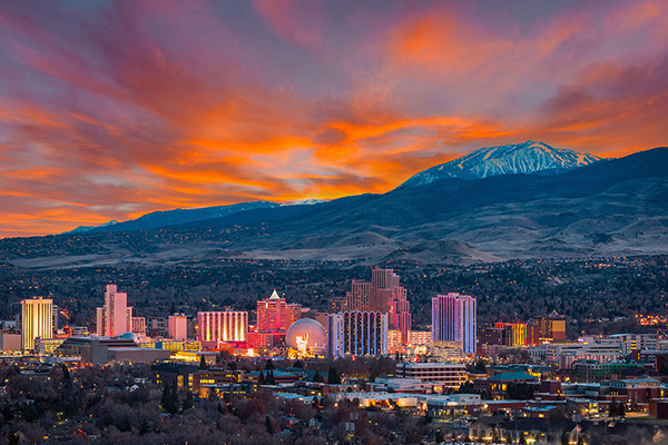 Skyline photo of Las Vegas at sunset.
