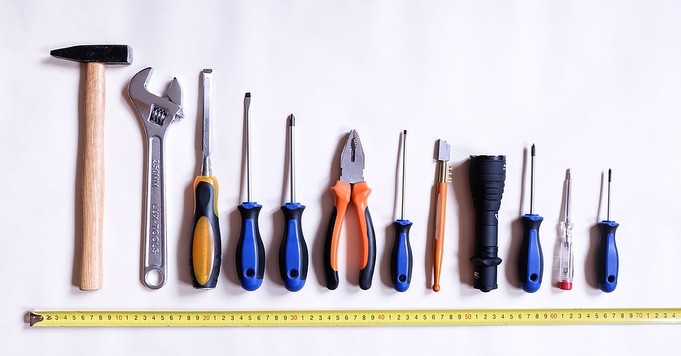 <img src="tools-2145770_960_720.jpg" alt="standard construction tools lined in a row">